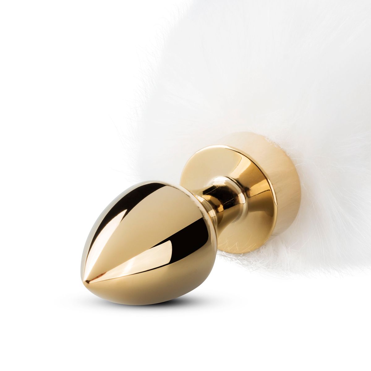 Kleine goudkleurige buttplug met witte vossenstaart